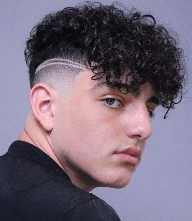 Curly Fade with a Line